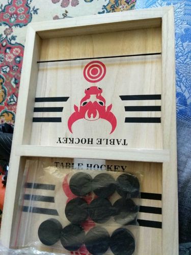 Customer photo review of Fast Sling Puck Board Game