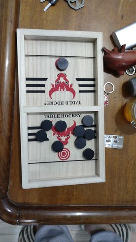 Customer photo review of Fast Sling Puck Board Game