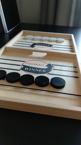 Customer photo review of Fast Sling Puck Board Game
