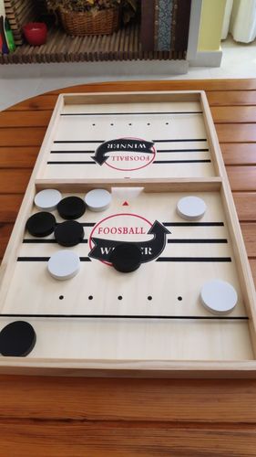 Customer photo review of Fast Sling Puck Board Game