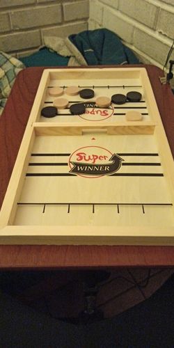 Customer photo review of Fast Sling Puck Board Game