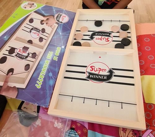 Customer photo review of Fast Sling Puck Board Game