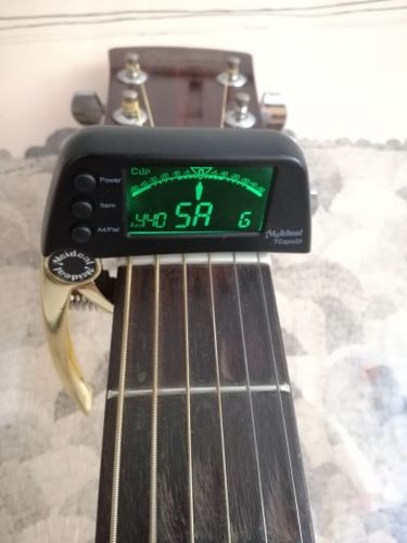 Customer photo review of TCapo20 Acoustic Guitar Tuner Capo Quick Change Key Capo Tuner Alloy Material for Electric Guitar Bass Chromatic Accessories