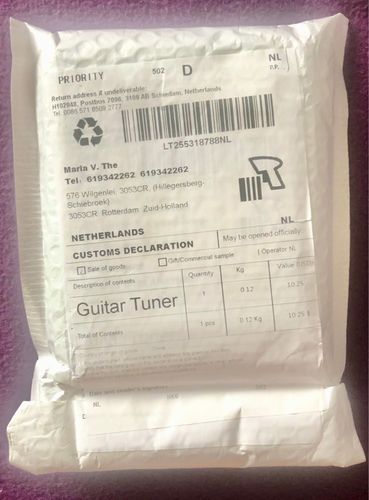 Customer photo review of TCapo20 Acoustic Guitar Tuner Capo Quick Change Key Capo Tuner Alloy Material for Electric Guitar Bass Chromatic Accessories