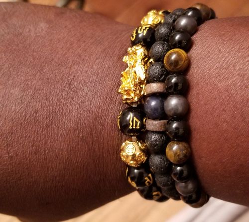 Customer photo review of Black Obsidian Carved Buddha God of Fortune Lucky Necklace