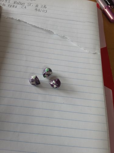 Customer photo review of 15.5" 10mm/12mm Dyed dark purple green rain flower stone skull