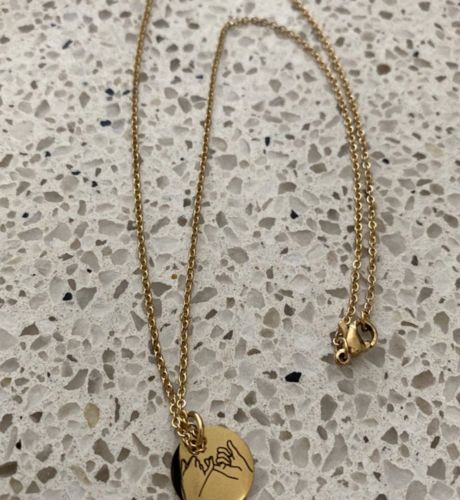 Customer photo review of Mia Hand Gesture Necklace