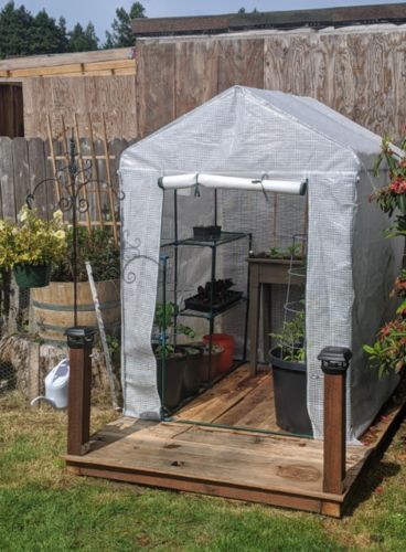 Customer photo review of 56"x 84" x 77" Small Portable Greenhouse Walk-in Greenhouses with 2 Tier 6 Shelves, White