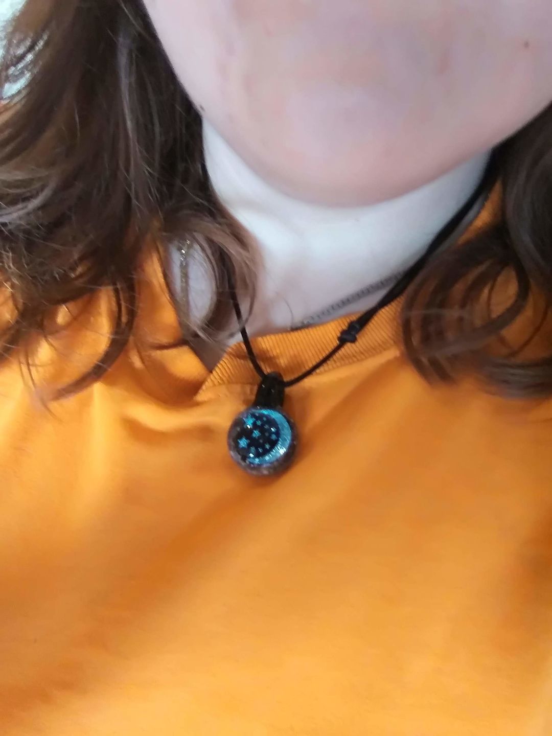 Customer photo review of Moon and Stars Hologram Pendant with Infused Cremation Ash