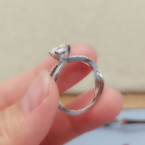 Customer photo review of Moissanite Four Paws Cross Arm Twist Sterling Silver Ring