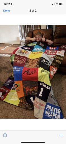 T-shirt quilt with sports, gaming themes by Deborah from TX