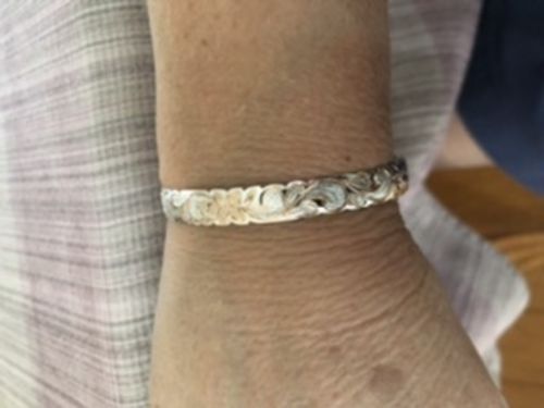 Customer photo review of Hawaiian Jewelry Scroll Cut Out Pink Cuff Bangle