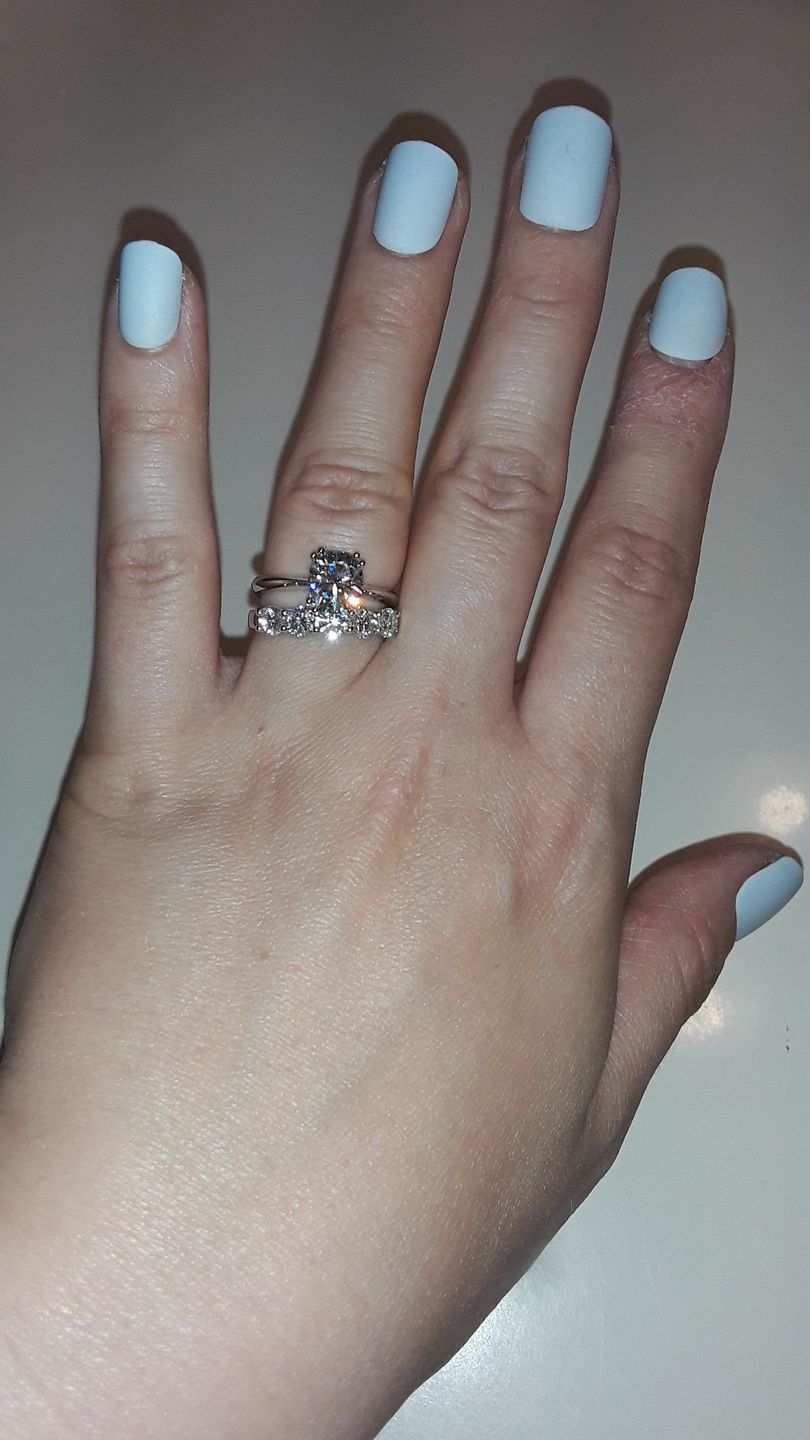 Customer photo review of Doveggs five stone moissanite wedding band/moissanite ring/lab diamond band