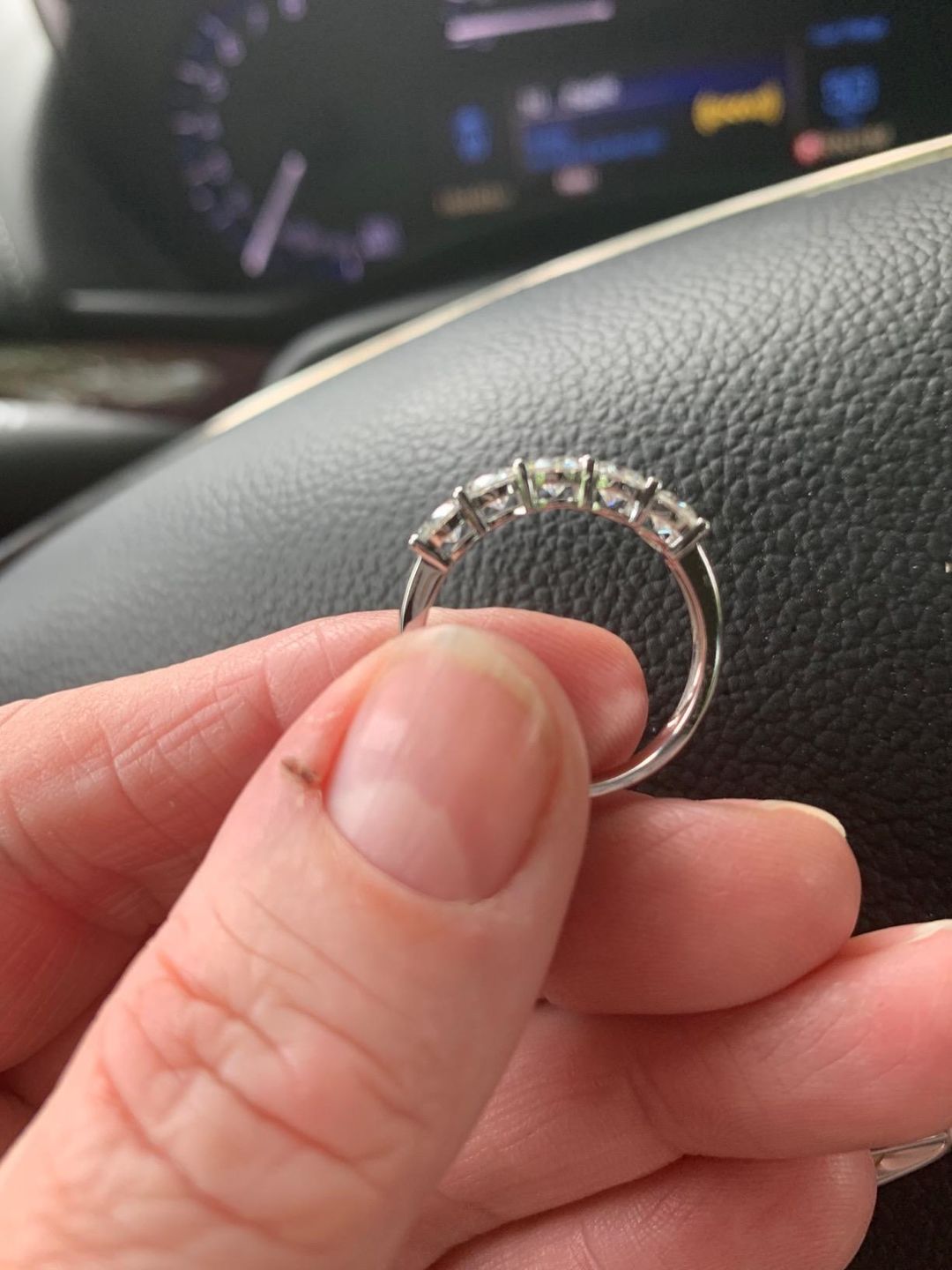 Customer photo review of Doveggs five stone moissanite wedding band/moissanite ring/lab diamond band