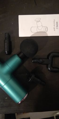 Customer photo review of Mini Size Electric Massage Gun With Bright Colour Options