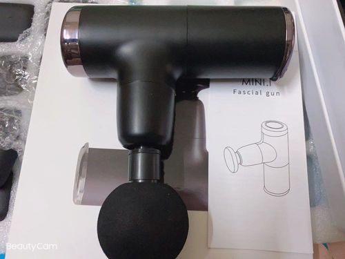Customer photo review of Mini Size Electric Massage Gun With Bright Colour Options