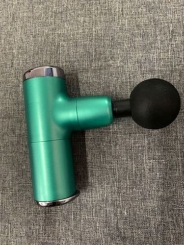 Customer photo review of Mini Size Electric Massage Gun With Bright Colour Options