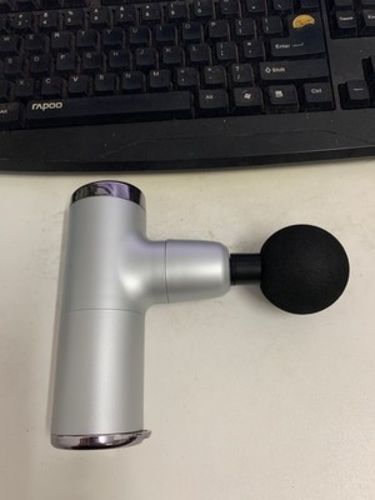 Customer photo review of Mini Size Electric Massage Gun With Bright Colour Options