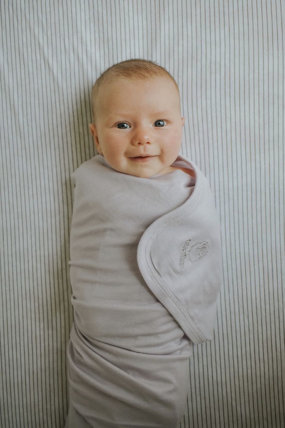 Customer photo review of Swaddle Blanket, Merino Wool, Newborn to 3 Months, Crystal Pink