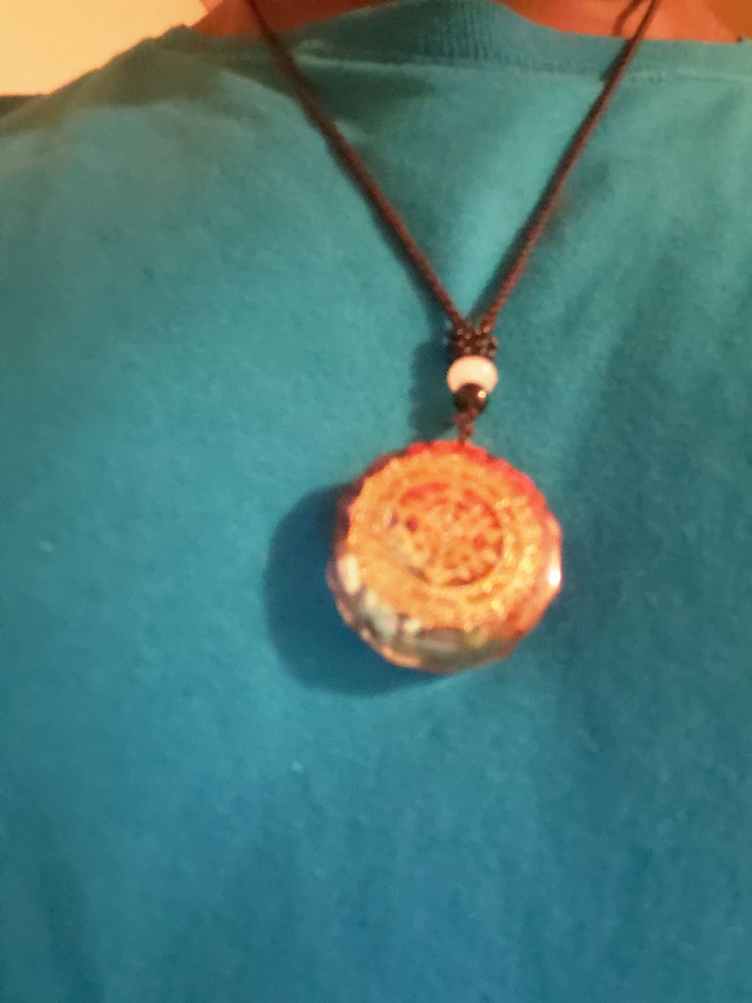 Customer photo review of Sacred Sri Yantra Orgonite Chakra Necklace