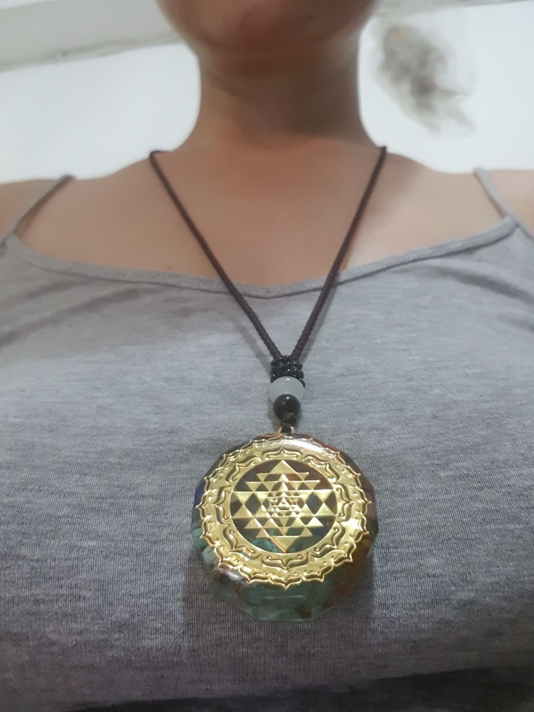 Customer photo review of Sacred Sri Yantra Orgonite Chakra Necklace