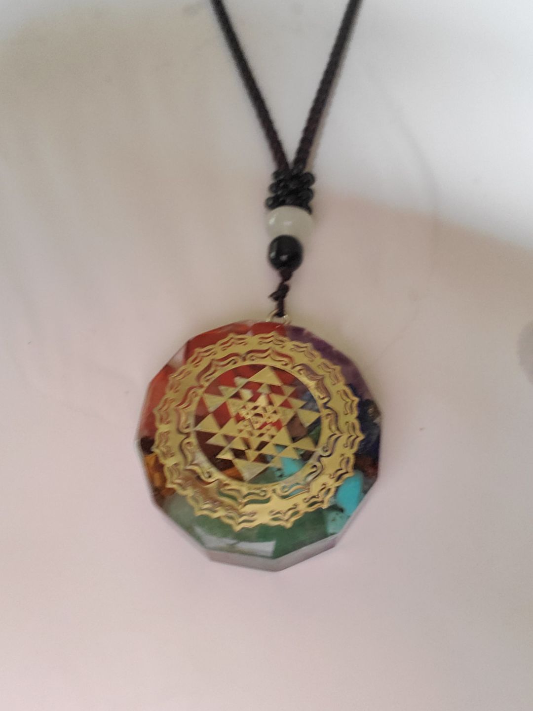 Customer photo review of Sacred Sri Yantra Orgonite Chakra Necklace