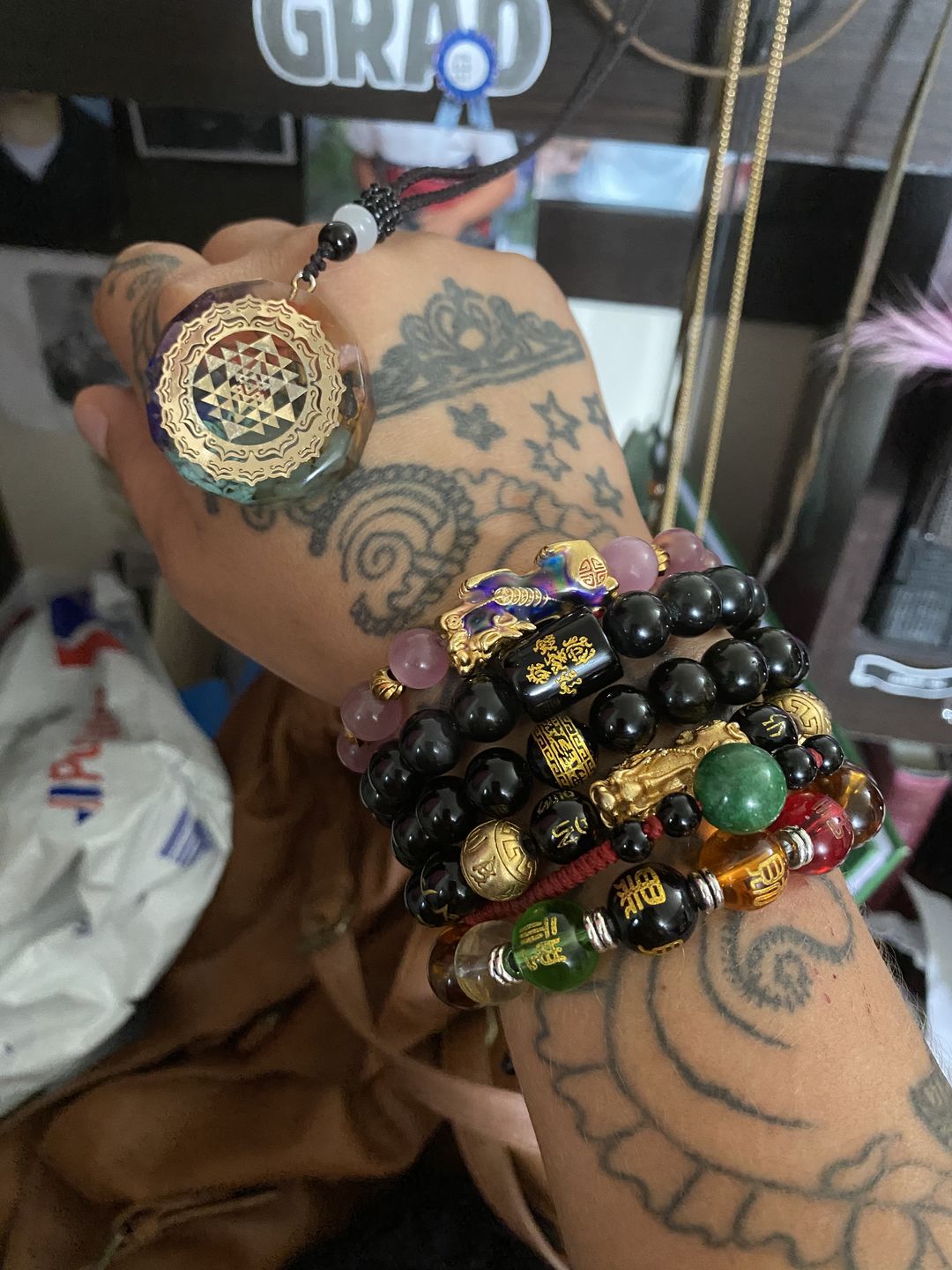 Customer photo review of Sacred Sri Yantra Orgonite Chakra Necklace