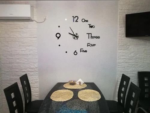 Customer photo review of Horloge Murale Moderne Design