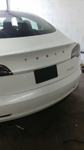 Customer photo review of Trunk "T E S L A" Letters Emblem for Model 3 & Y