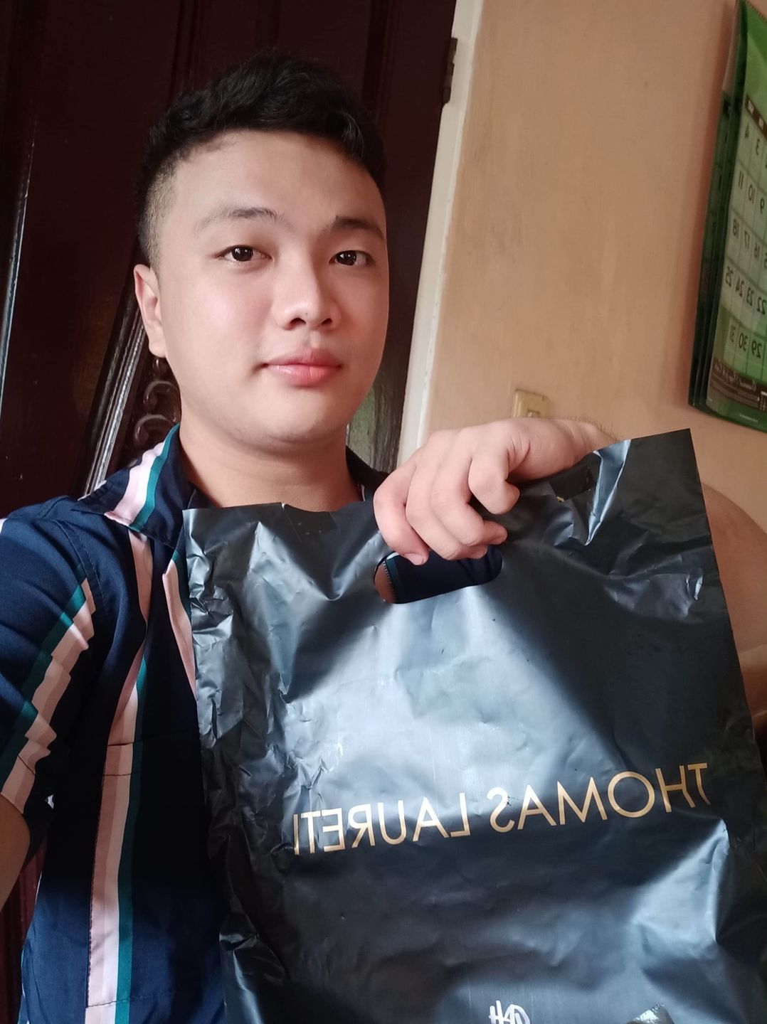 Customer photo review of Men's Thomas Laureti Black Polo Shirt