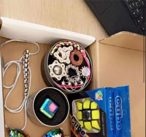 Customer photo review of "The Works"  Fidget Kit - try ALL seven best sellers in one tin!  Save $25!
