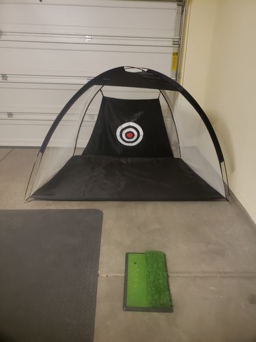 Customer photo review of Golf Practice Driving Net for Indoors and Outdoors | Tri-Turf Hitting Mat