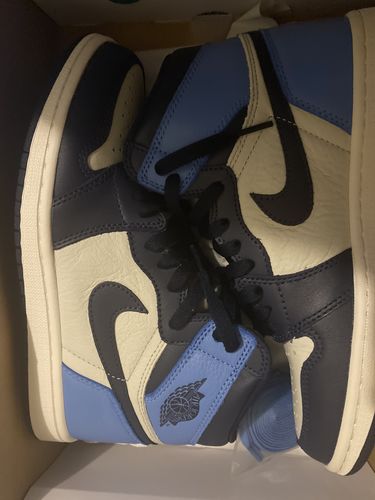 Customer photo review of Jordan 1 Retro High Obsidian UNC