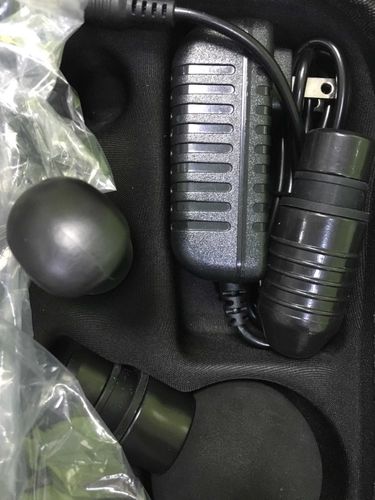 Customer photo review of LCD Touch Screen Massage Gun With 6 Massage Heads And Multiple Color Options