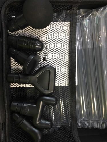 Customer photo review of LCD Touch Screen Massage Gun With 6 Massage Heads And Multiple Color Options