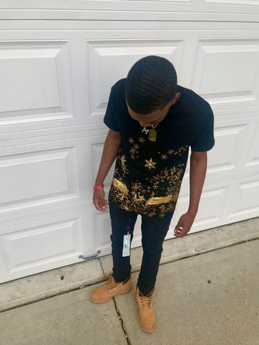 Customer photo review of OFF WHITE SNOW T-SHIRT