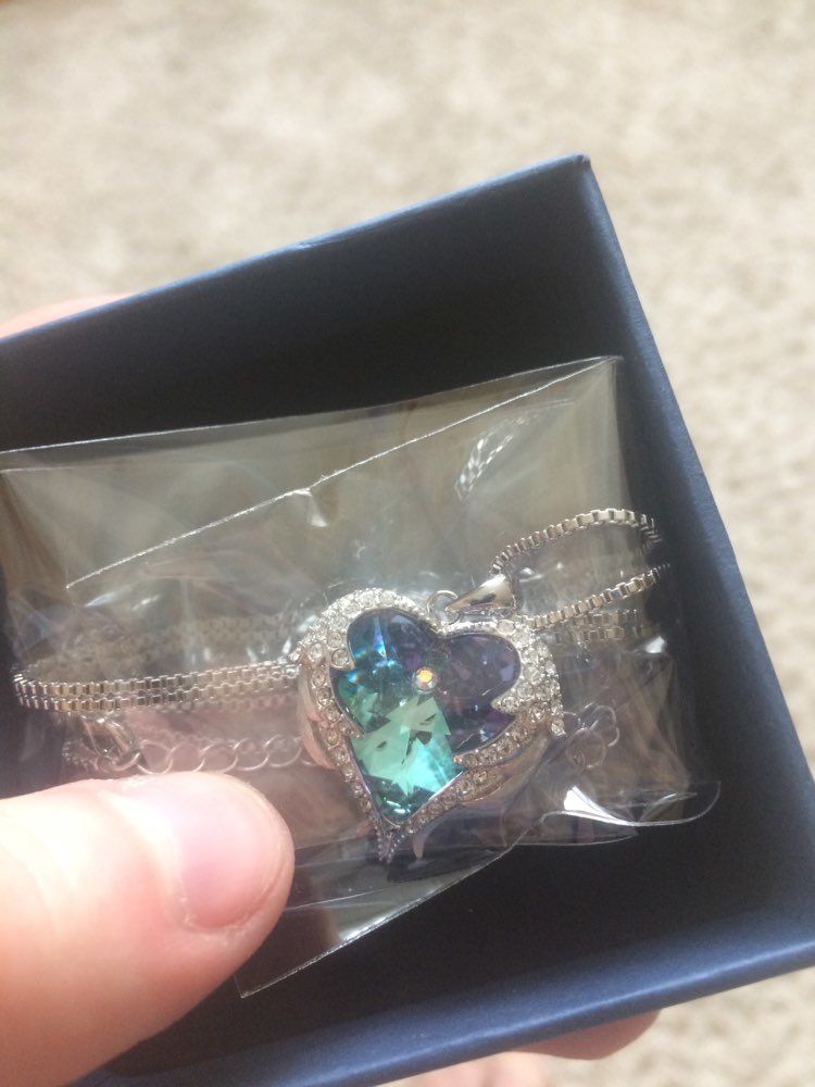 Customer photo review of Engelsflügel Halskette | 925 Sterling Silber | Dein Schutzengel für unterwegs