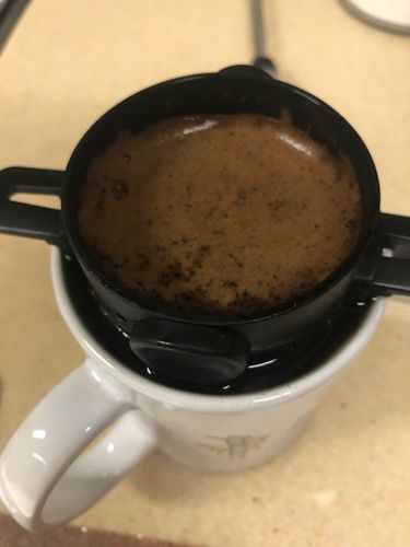 Customer photo review of Coffee Filter Portable 304 Stainless Steel Drip Coffee Tea Holder Funnel Baskets Reusable Stand Coffee Dripper With Filter Cup