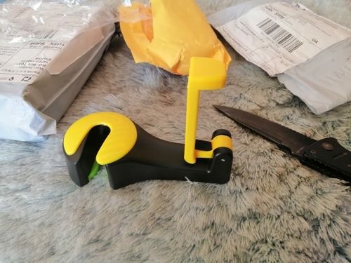 Customer photo review of Car Headrest Hook with Phone Holder Seat Back Hanger for Bag Handbag Purse Grocery Cloth Portable Multifunction Clips Organizer