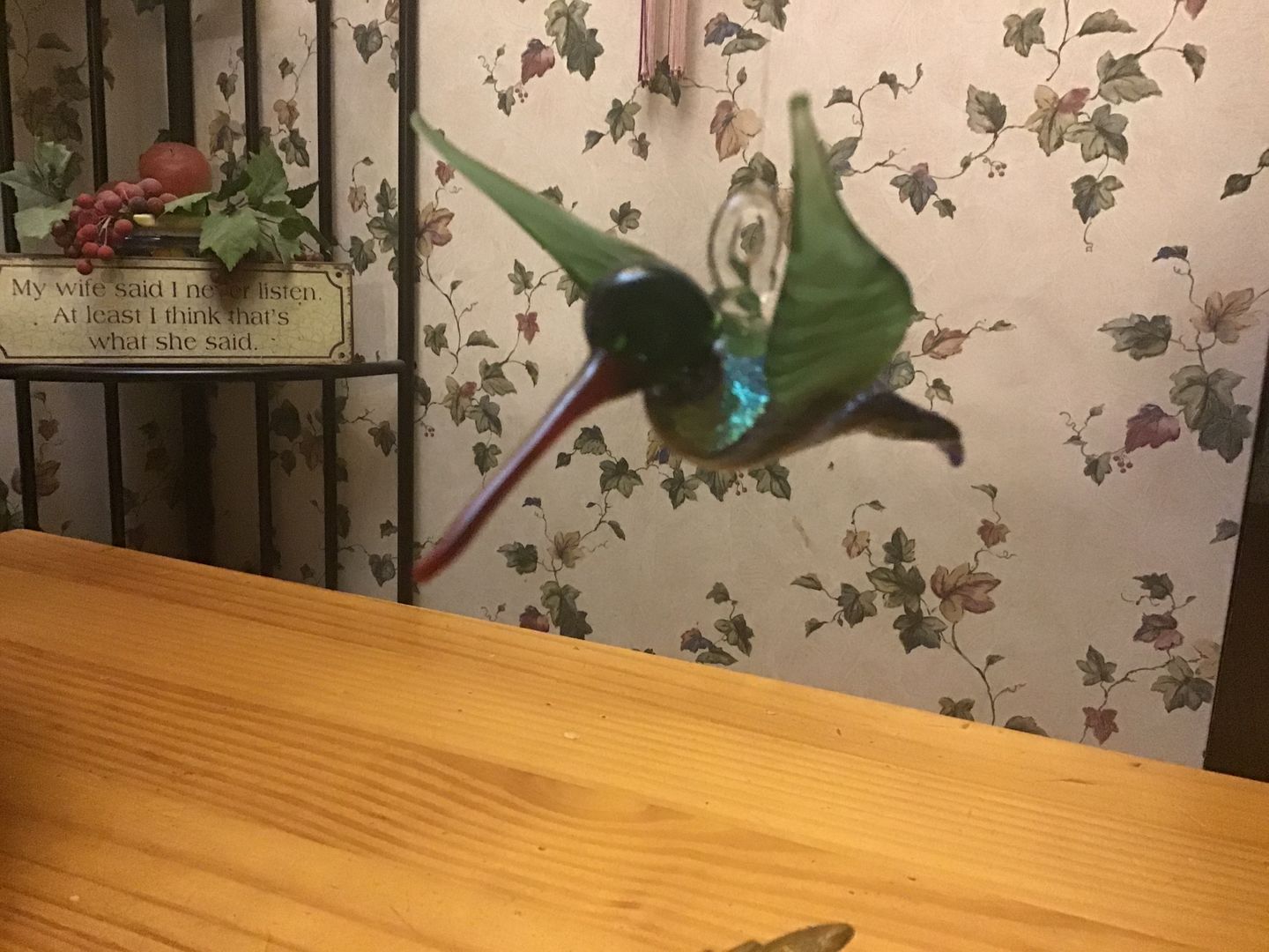 Customer photo review of Dichroic Twist Glass Hummingbird with Infused Ash