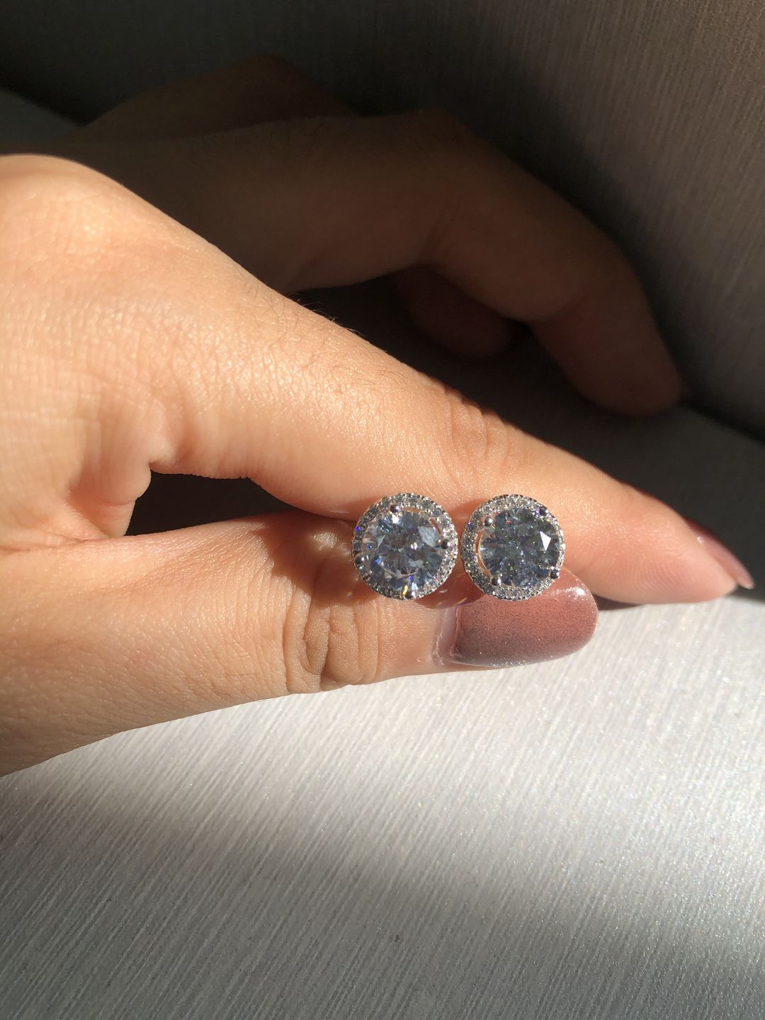 Customer photo review of Louily Sterling Silver Classic Halo Round Cut Earring