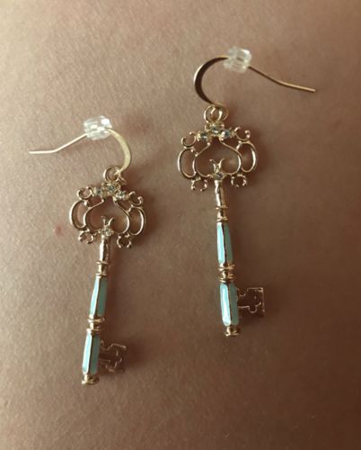 Customer photo review of Golden Key Statement Earrings