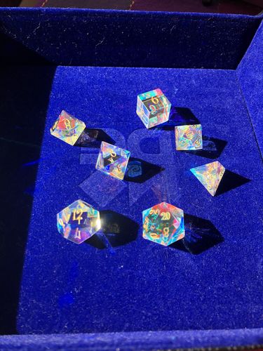 Customer photo review of URWizards Dnd Dichroic Prism Glass Gemstone Engraved Dice Set