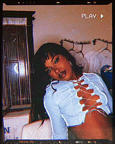 Customer photo review of Lace up long sleeve patchwork top