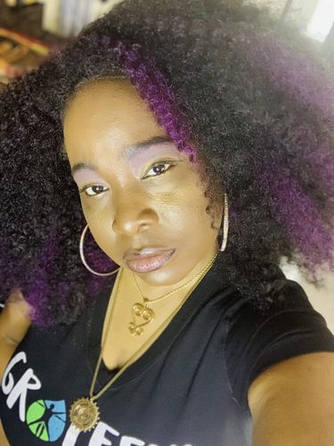 Customer photo review of Sankofa Adinkra Necklace