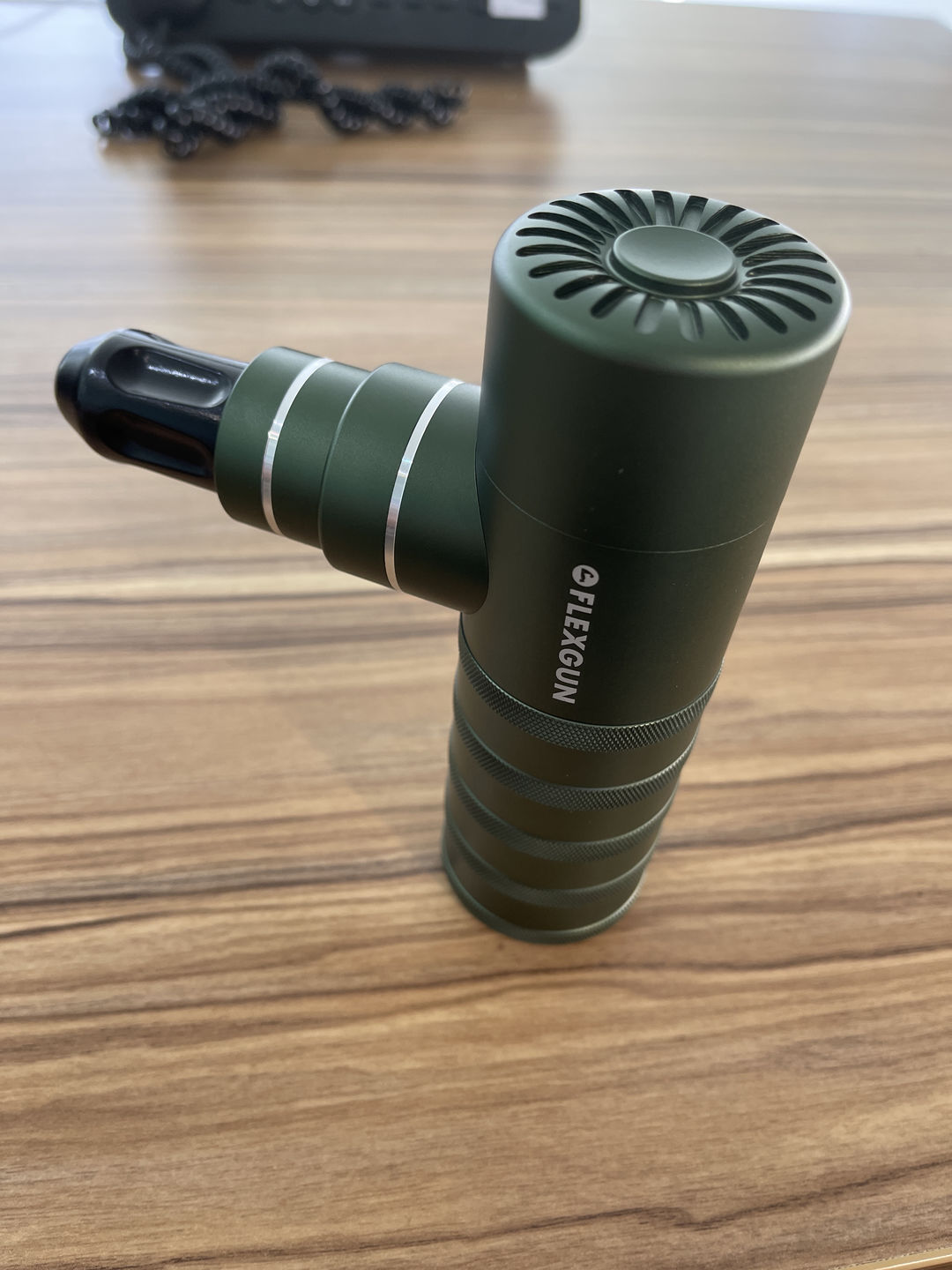 Customer photo review of Flexgun mini. Compact on-the-go treatment.