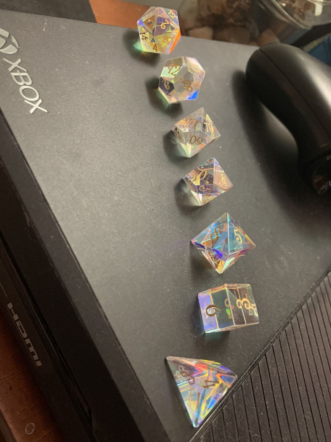 Customer photo review of URWizards Dnd Dichroic Prism Glass Gemstone Engraved Dice Set Triforce
