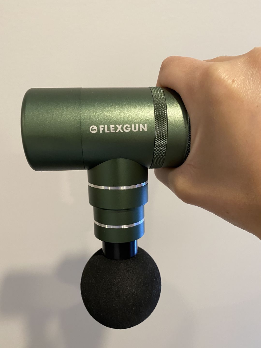 Customer photo review of Flexgun mini. Compact on-the-go treatment.