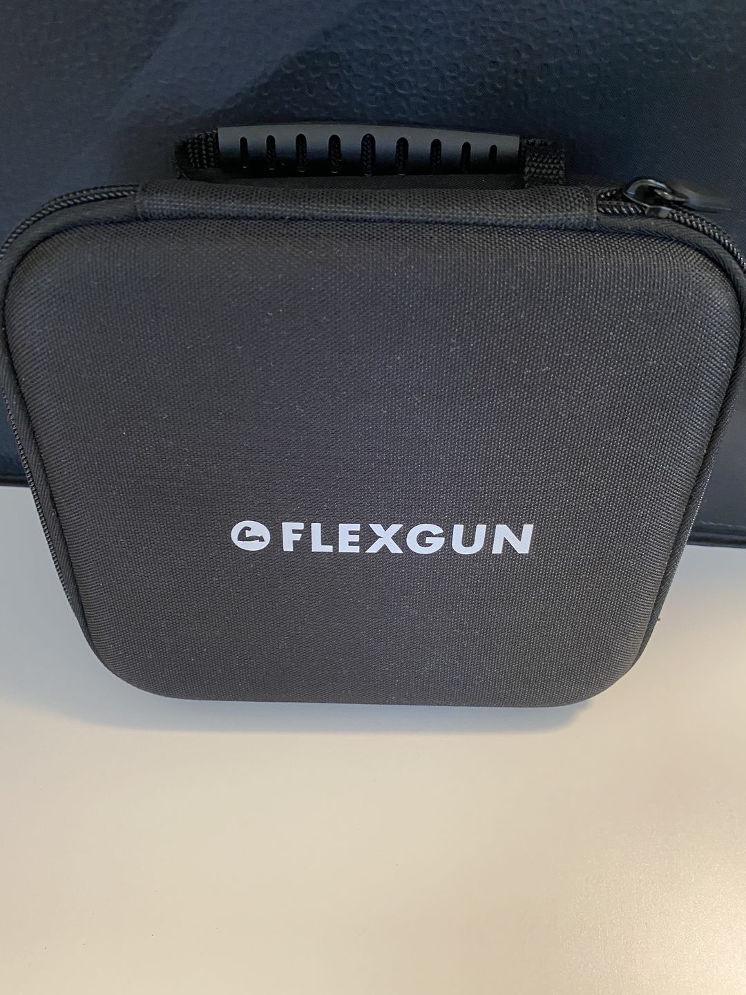 Customer photo review of Flexgun mini. Compact on-the-go treatment.
