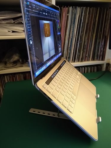 Customer photo review of Laptop Stand | Aluminium, Portable & Foldable